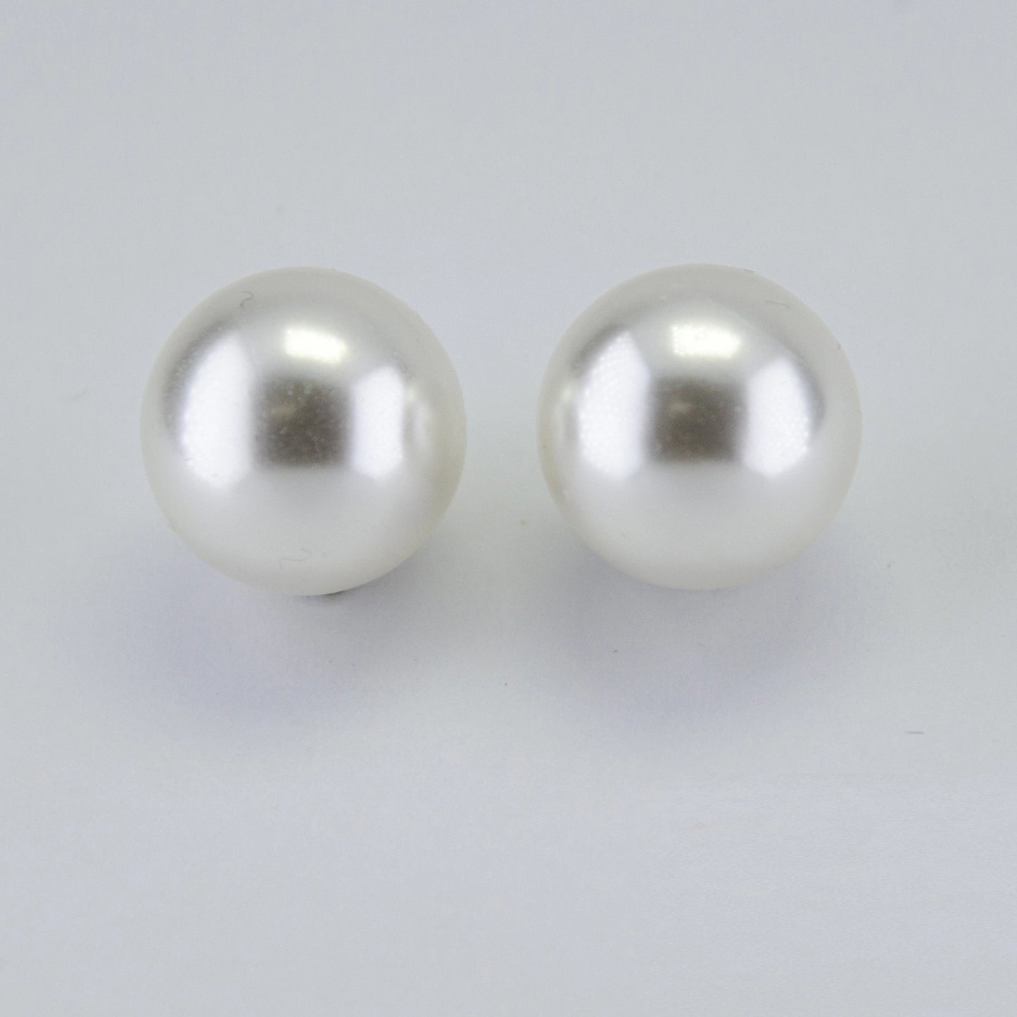 Rhodium Plated Shimmering Pearl Stud Earrings - White