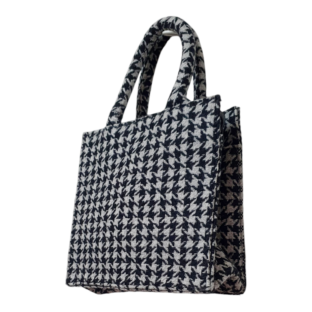 Elegant Houndstooth Handbag with Dual Carrying Options