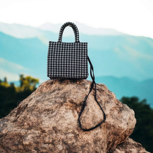 Elegant Houndstooth Handbag with Dual Carrying Options