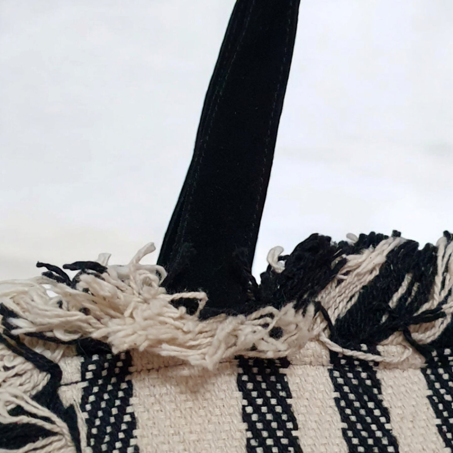 Black and White Striped Tote Bag with Fringe Detail