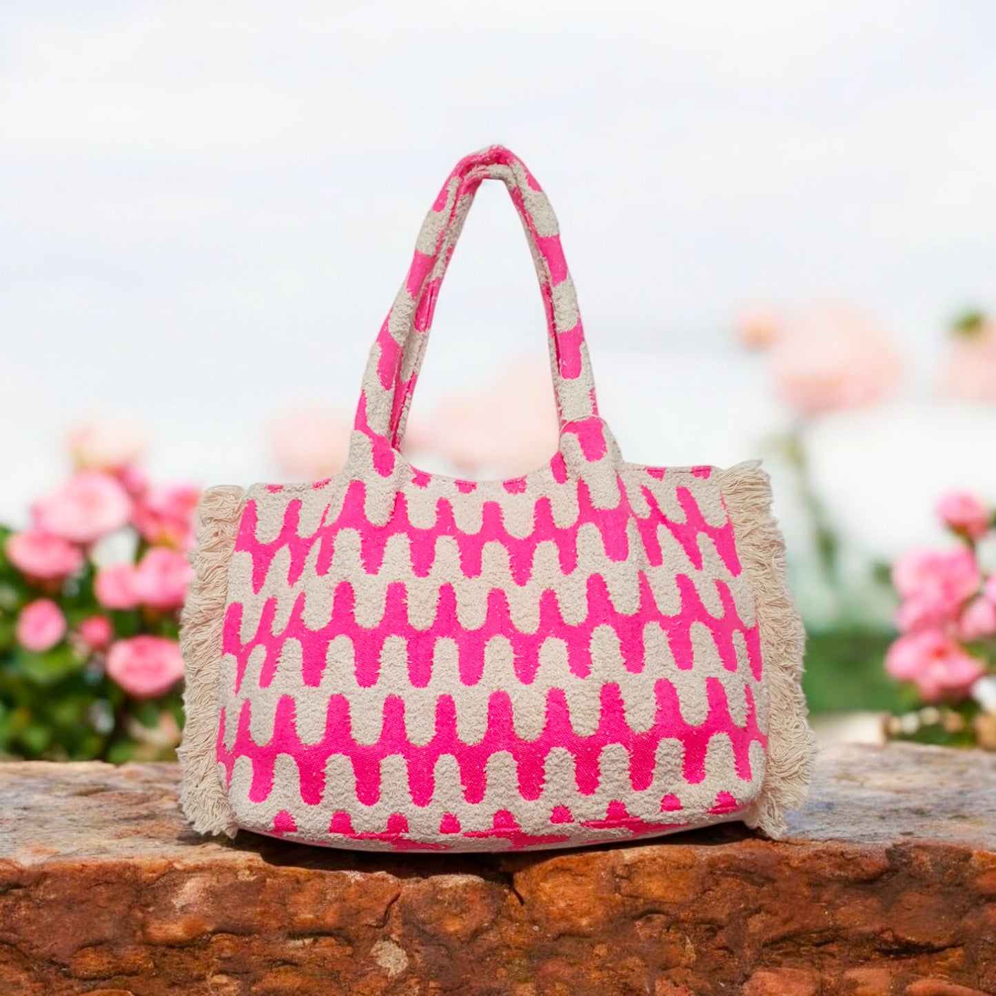 Vibrant Pink and Beige Boho Tote Bag with Textured Wavy Pattern and Fringe Sides