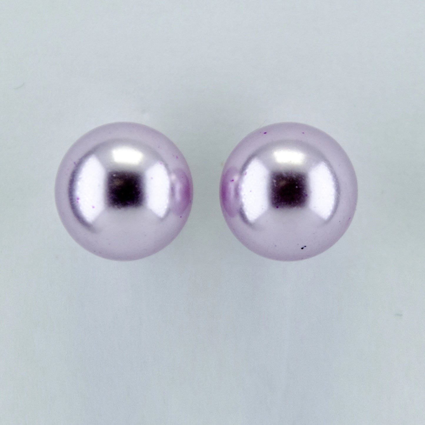 Rhodium Plated Shimmering Pearl Stud Earrings - light Purple